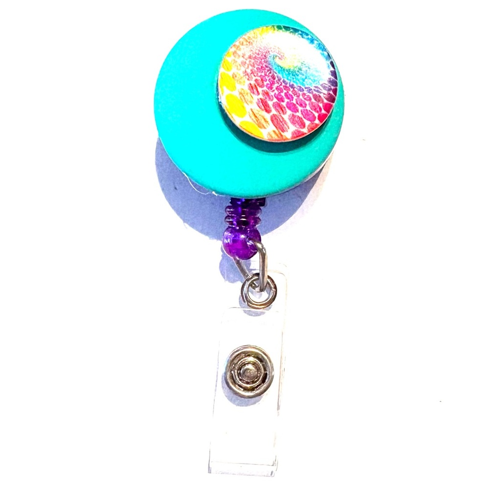 Retractable badge holder